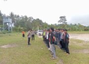 Kapolsek Mendo Barat dan Personel Gabungan Amankan Kampanye Calon Bupati H. Mulkan di Desa Labuh Air Pandan